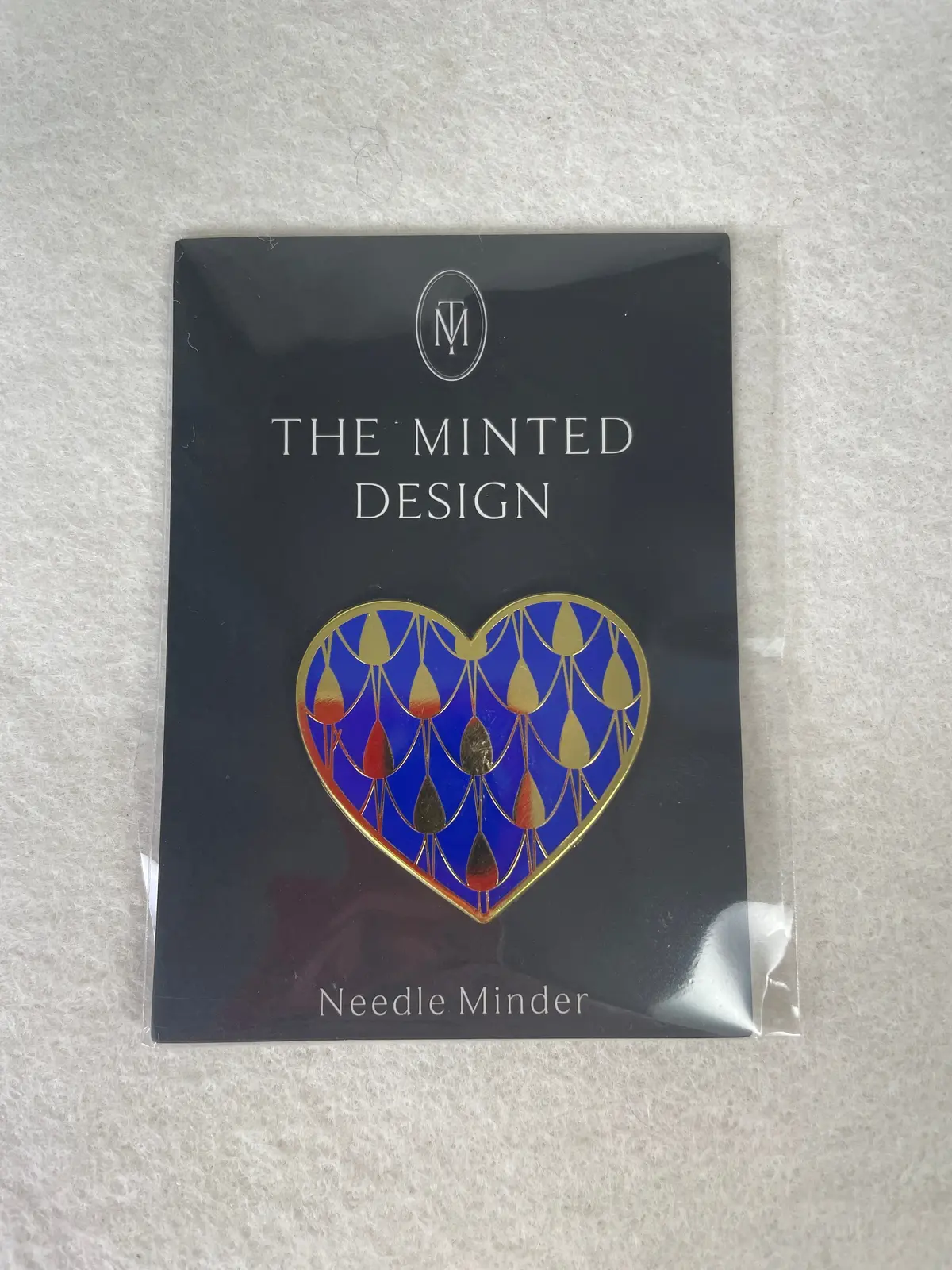 The Minted Design Designer Inspired Navy Heart Needle Minder 1