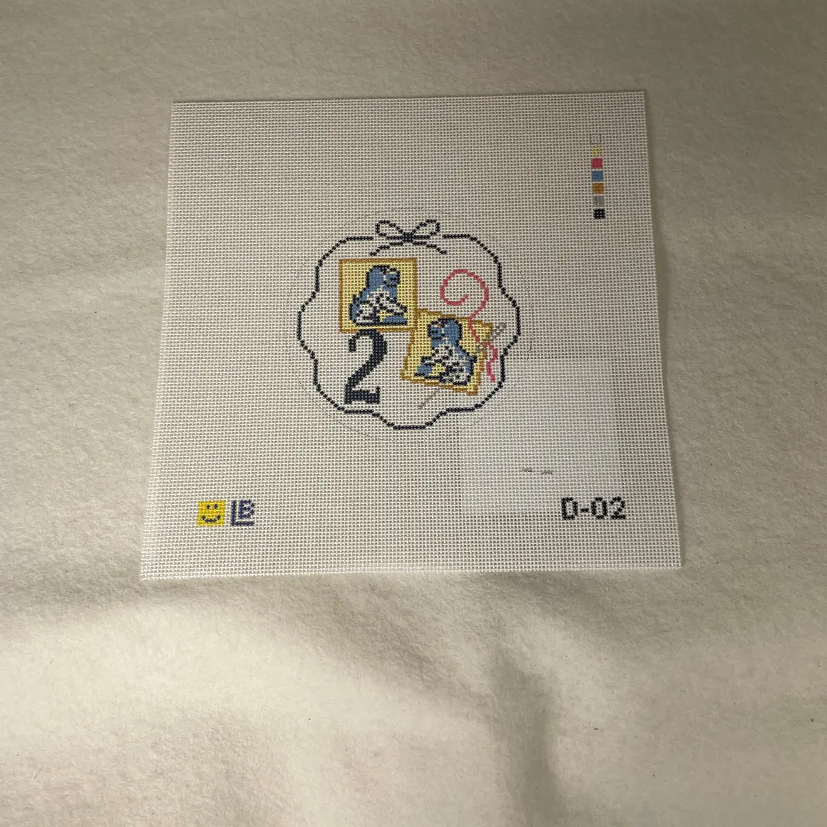 * Lauren Bloch  D02- 12 Days Of Needlepoint- Two Foo Dog Needle Minders 1